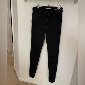 Levi’s 720 High Rise Super Skinny Black Jeans in size 28.